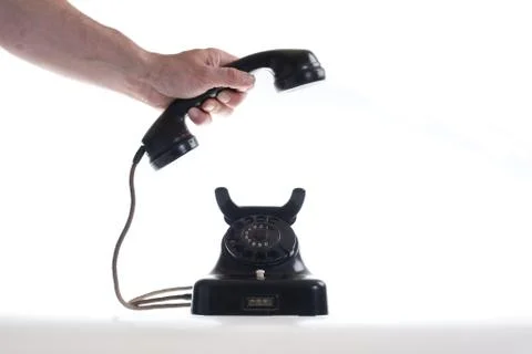 Picking up the phone Stock Photos