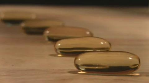 Picking up pills one by one Video stock 710807