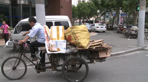 Picking up plastic bottle dropped on street Stock Footage 37699198
