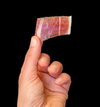 Picking serrano ham Stock-Fotos