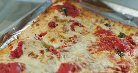 Picking up a slice of pizza Stock Footage 99737022