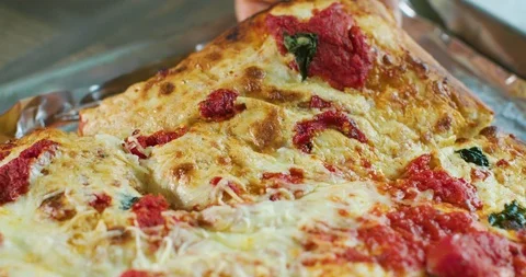 Picking up a slice of pizza Stock Footage 99737214