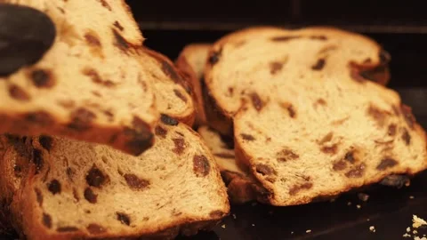 Picking Up A Slice Of Sweet, Sultana Bread For Breakfast, At A Restaurant, UK Stock Footage 274440935