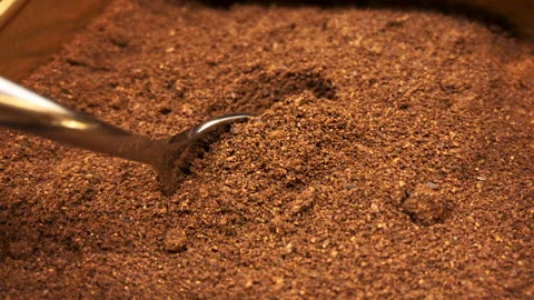 Picking a teaspoon of ground coffee Stock Footage 246068276
