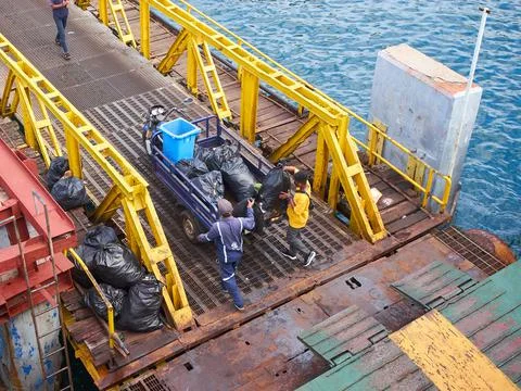 Picking up trash Stock Photos