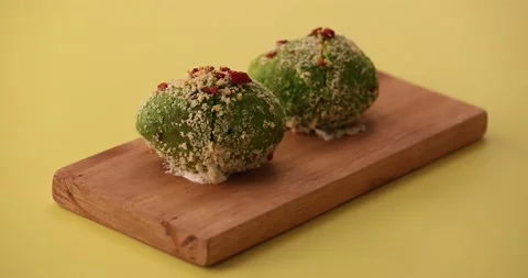 Picking up a tray of avocados 2 Stock Footage 132136381