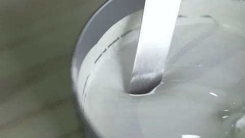 Picking up white paint with chisel Video stock 160518140