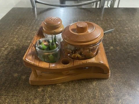 Pickle set on table along with salt, green chilli and pickle full startup p.. Stock Photos