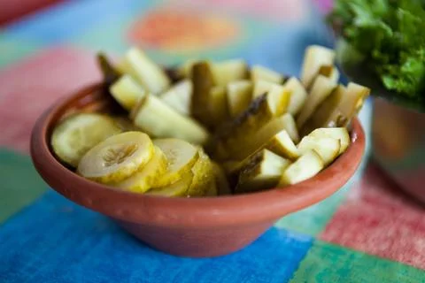 Pickle slices on pot Stock Photos