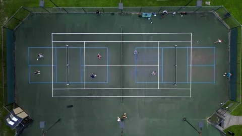 Pickleball day time drone shot two courts drop down Vídeos de archivo 279846170