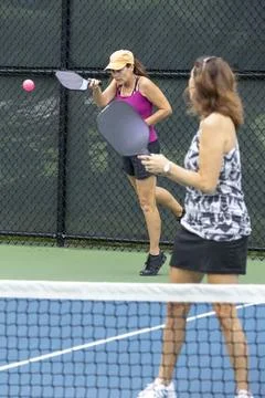 Pickleball Player Return Serve Stock Photos