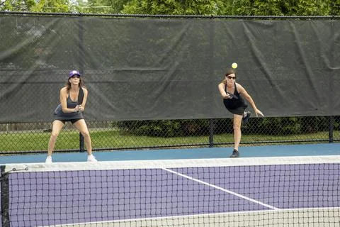 Pickleball Player Serving Stock Photos