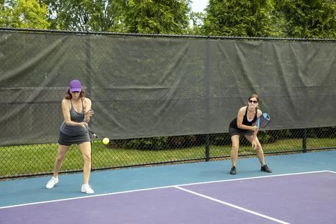 Pickleball Player Serving Stock Photos