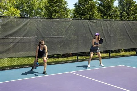 Pickleball Server and Partner Stock Photos