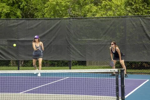 Pickleball Server and Partner Stock Photos