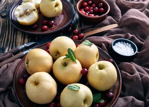 Pickled apples served on an earthenware plates Stock Photos