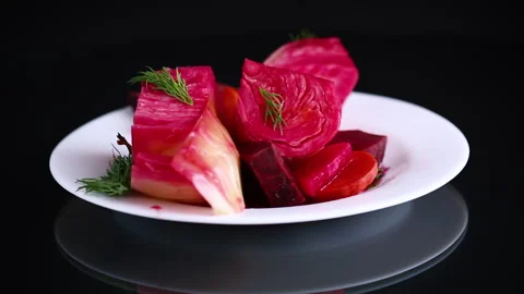 Pickled cabbage with beets and carrots, in a plate Stock Footage 293085334