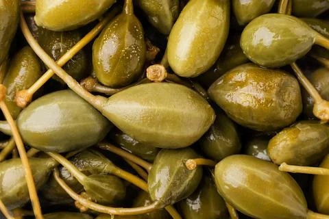 Pickled capers background. The view from top Foto stock