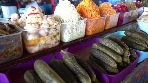 Pickled cucumbers and Korean appetizers Stock Footage 79864123