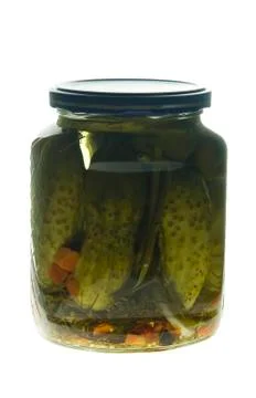 Pickled cucumbers in a jar Stock Photos