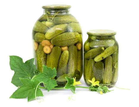 Pickled cucumbers in jars Stock Photos