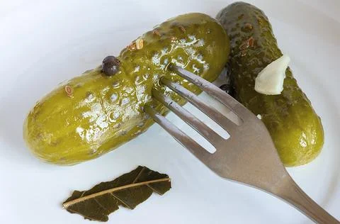 Pickled cucumbers on a plate 스톡 사진