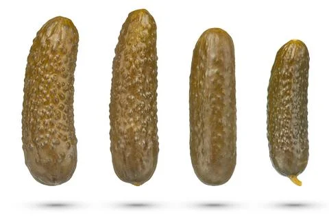 Pickled cucumbers on a white isolated background. Marinated cucumbers of Stock Photos
