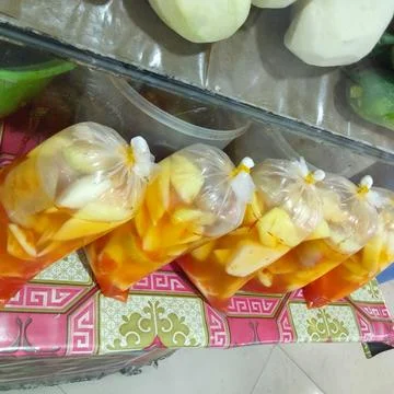 Pickled fruit in plastic packaging Stock Photos