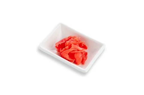 Pickled ginger root in a white rectangular gravy boat. Seasoning for sushi. W Stock Photos