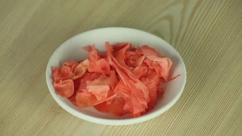 Pickled ginger sushi in a bowl on the table Stock Footage 174720719