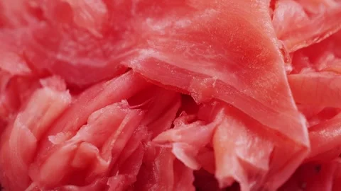 Pickled red ginger for sushi or rolls. Ginger for Asian cuisine. Stock Footage 316689514