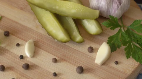 Pickled sliced cucumbers on the kitchen board Vídeos de archivo 252122208