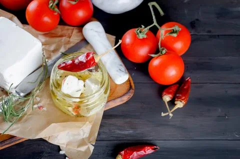 Pickled soft cheese, bread and tomatoes Stock-Fotos
