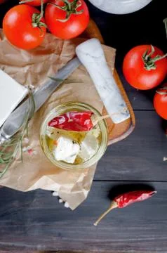 Pickled soft cheese, bread and tomatoes Stockfoto's