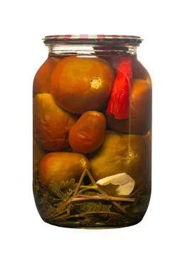 Pickled tomatoes in a jar Stock Photos