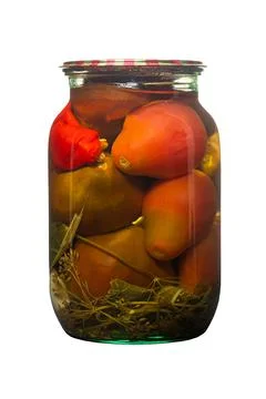 Pickled tomatoes in a jar Stock Photos