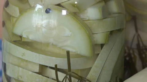 Pickled zucchini in a jar Stock-Footage 212973027