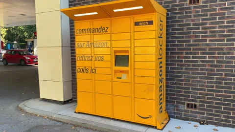 Pickup Amazon locker, a self-service package delivery machine by Amazon Stock Footage 159137024