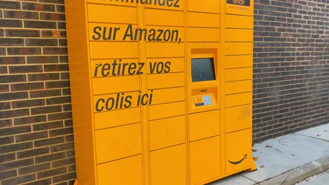 Pickup Amazon locker, a self-service package delivery machine by Amazon Stock Footage 159137210
