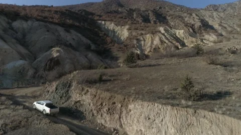 Pickup climbs the mountain road Stock Footage 145310020