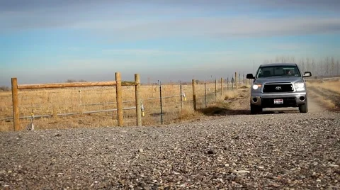Pickup Driving on a Dirt Road Stock Footage 41504467