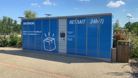 Pickup locker of a Decathlon store in Rives d'Arcins in Begles, France Stock Footage 154641007