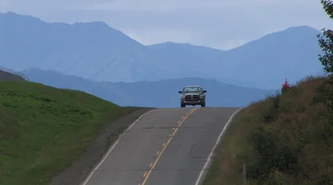 Pickup on a lonly mountain road Stock Footage 33302772