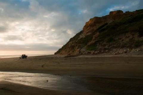 Pickup parked on a beach Fotos Stock