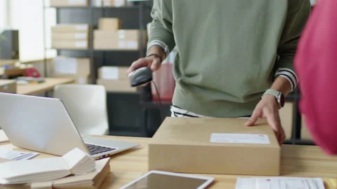 Pickup Point Worker Giving Parcel to Client Stock Footage 228493372