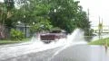Pickup Truck Drives Thru Flooded Neighborhood Street In Gulfport Florida 4k or 4k+ Resolution