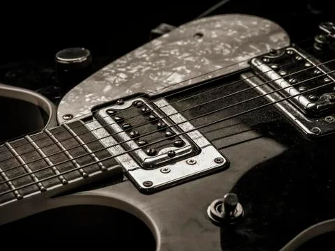 Pickups and strings of old electric guitar Foto stock