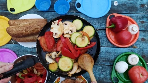 Picnic and nature: flat lay photography. On a blue vintage table is a burner wit Stock Footage 120140867