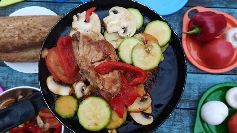 Picnic and nature: flat lay photography. On a blue vintage table is a burner wit Stock-Footage 120140903