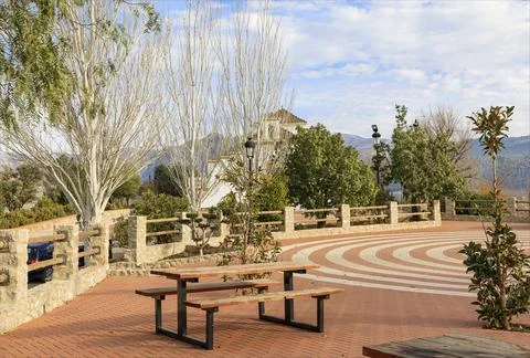 Picnic area with circular floor pattern Stock Photos